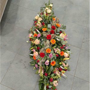Dessus de cercueils en fleurs pour les deuils à Toulouse