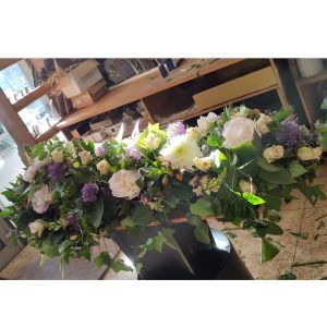 Dessus de cercueils en fleurs pour les deuils à Toulouse